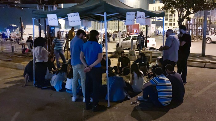 Christians from Ras Beirut Baptist Church host discussions at the protest site.