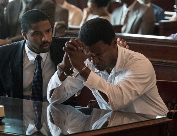 MICHAEL B. JORDAN as Bryan Stevenson and JAMIE FOXX as Walter McMillian in Warner Bros. Pictures drama, JUST MERCY, a Warner Bros. Pictures release.