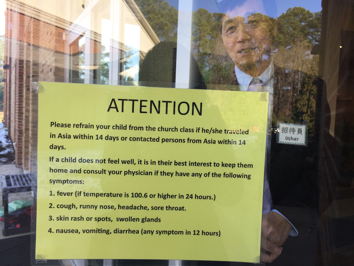 The sign outside Raleigh Chinese Christian Church warns parents not to bring their children to church if they traveled to Asia in the past two weeks. The sign outside Raleigh Chinese Christian Church warns parents not to bring their children to church if they traveled to Asia in the past two weeks.