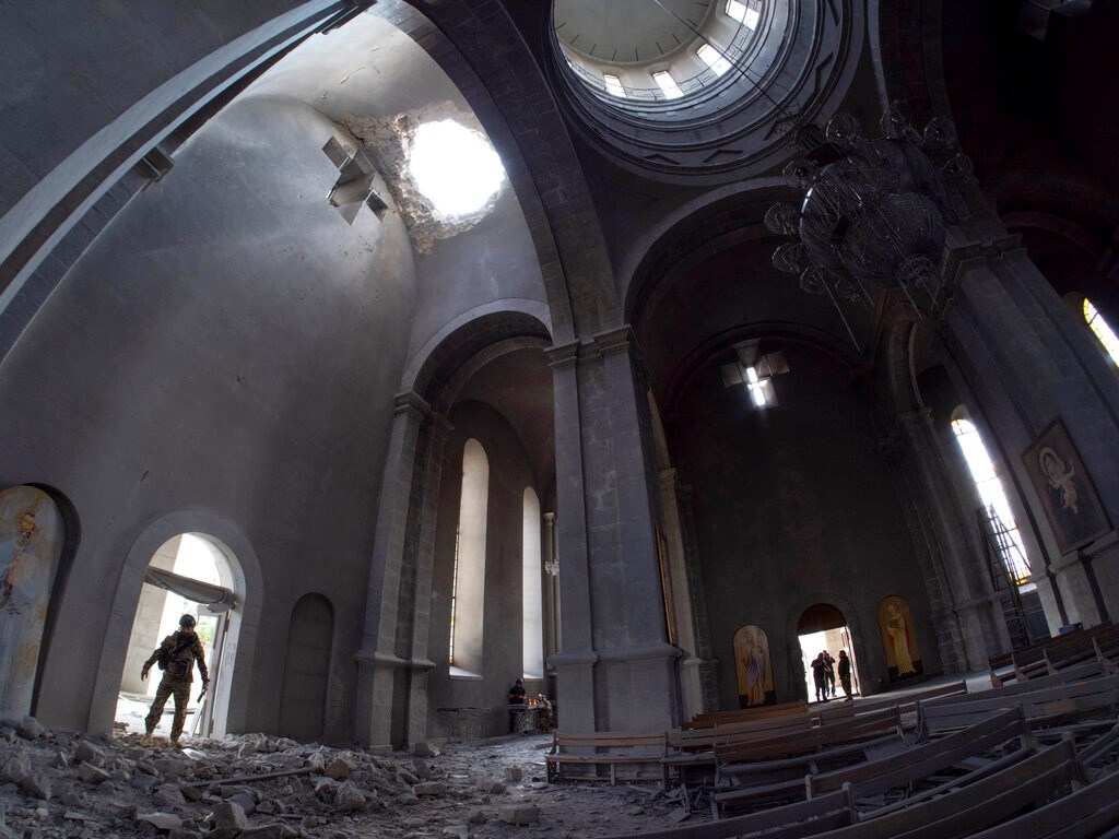 A hole made by shell in the roof of the Holy Savior Cathedral during a military conflict, in Shushi, outside Stepanakert, self-proclaimed Republic of Nagorno-Karabakh on October 8.