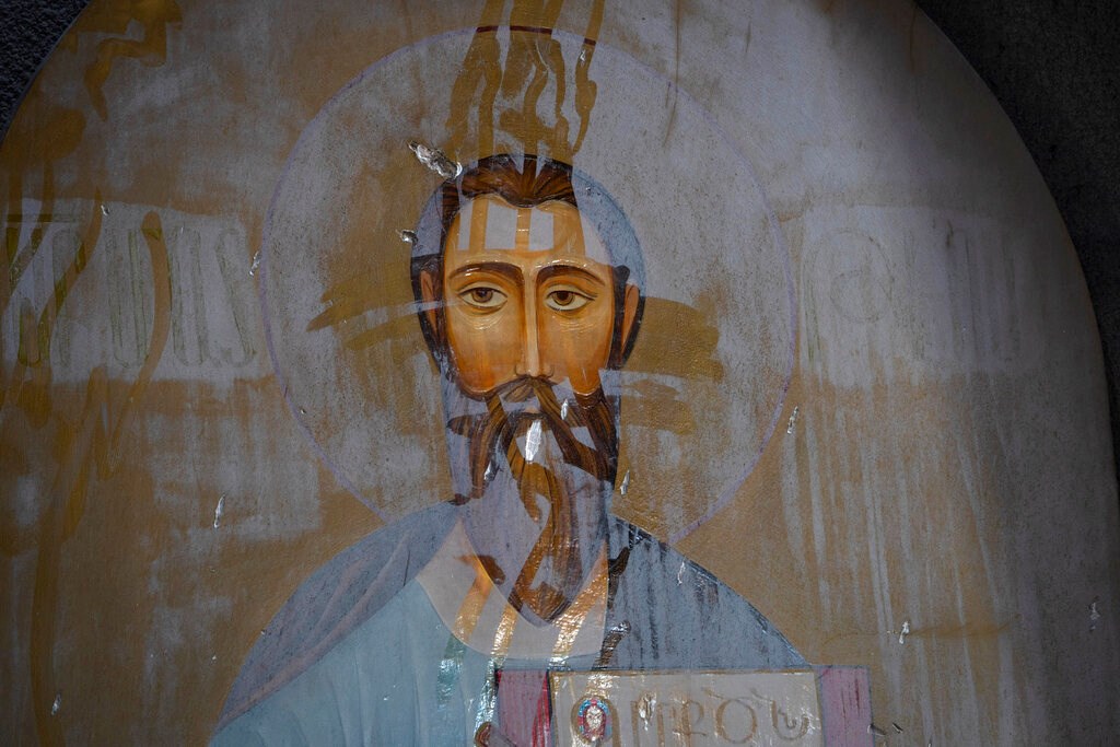 An icon covered with dust in the Holy Savior Cathedral damaged by shelling during a military conflict, in Shushi, outside Stepanakert, self-proclaimed Republic of Nagorno-Karabakh on October 8. An icon covered with dust in the Holy Savior Cathedral damaged by shelling during a military conflict, in Shushi, outside Stepanakert, self-proclaimed Republic of Nagorno-Karabakh on October 8.