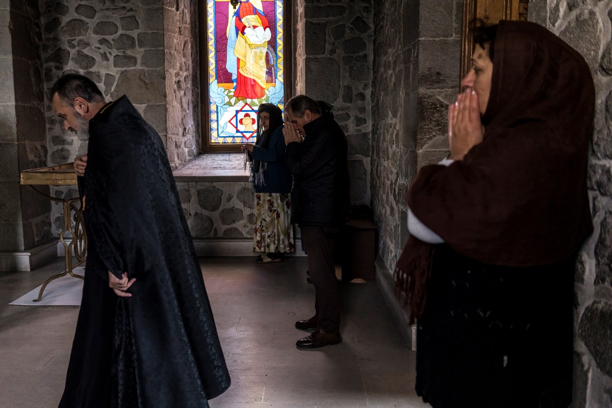 People gather for an evening service at the Kanach Zham church on October 2 in Shushi, Nagorno-Karabakh.