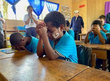 YPHP students pray in Mamit.