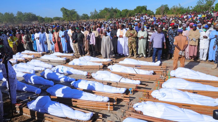 Image: Jossy Ola / Associated Press. People attend a funeral for those killed by suspected Boko Haram militants in Zaabarmar, Nigeria, on November 29.