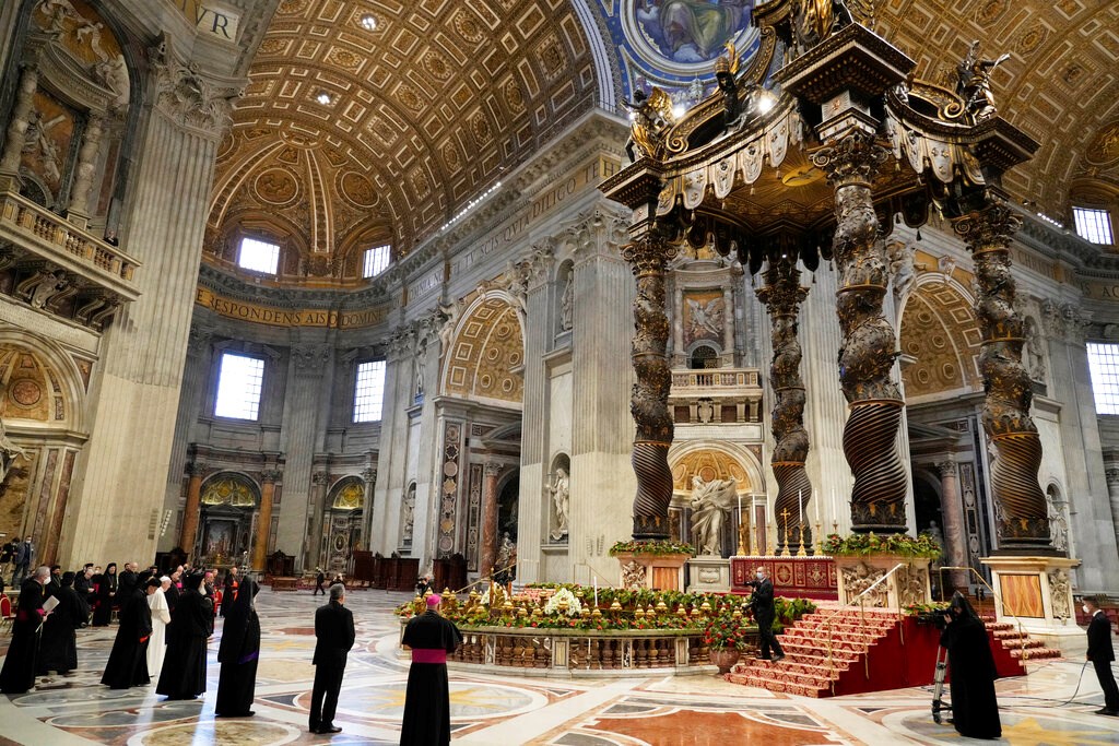 Pope Francis (left) attends a prayer with Lebanon’s Christian leaders in St. Peter’s Basilica on July 1, hosting them at the Vatican for a day of prayer amid fears that the country’s descent into financial and economic chaos is further imperiling the Christian presence in the country.