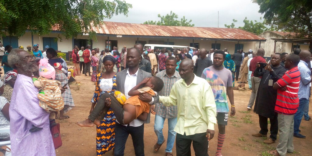 Parents are reunited with released students of the Bethel Baptist High School in Damishi, Nigeria, on Sunday, July 25.