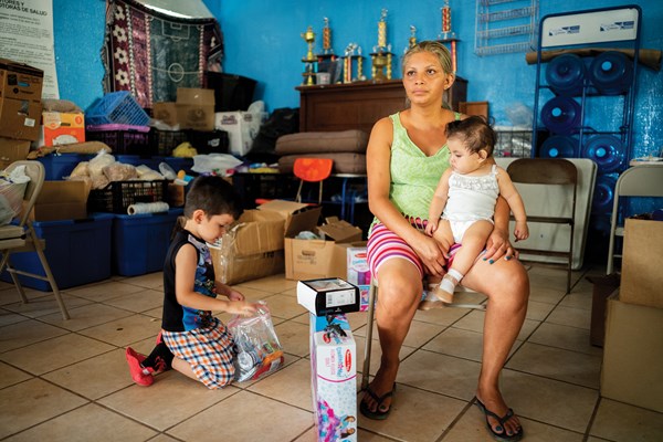 Donated toys and other goods, often designated for women and children, offer distraction from the tedium.