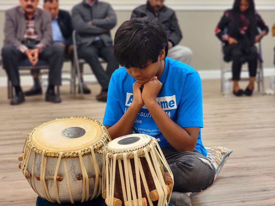 Saptak Aqeel Bhatti with his tabla, a traditional instrument used in Punjabi worship, at a Zabur celebration event on August 7, 2021, at Trinity International Christian Church in Philadelphia, Pennsylvania.