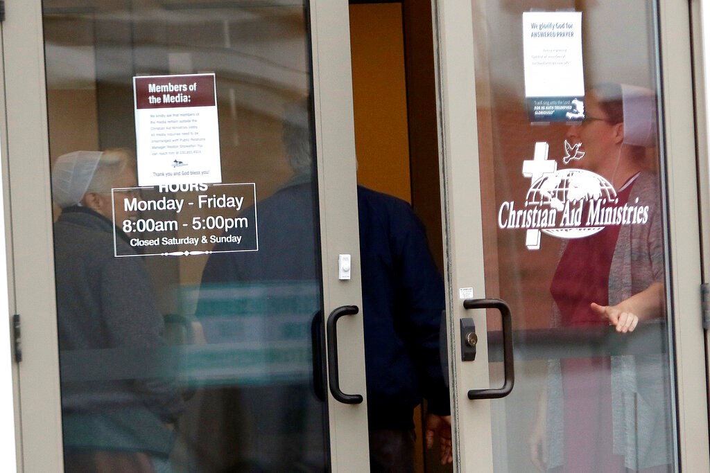 Visitors are granted entry at Christian Aid Ministries in Berlin, Ohio on Thursday, December 16.