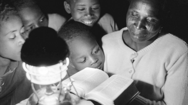 Reading the Kamwe New Testament. Reading the Kamwe New Testament.