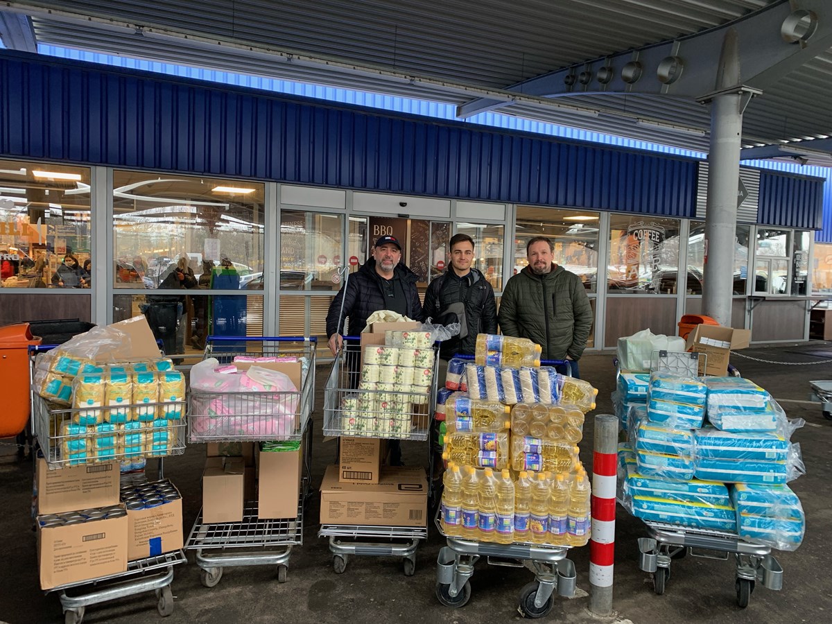 Alex Belev (left) and Eugene Solugubenco (right) shop for supplies for refugees. Alex Belev (left) and Eugene Solugubenco (right) shop for supplies for refugees.