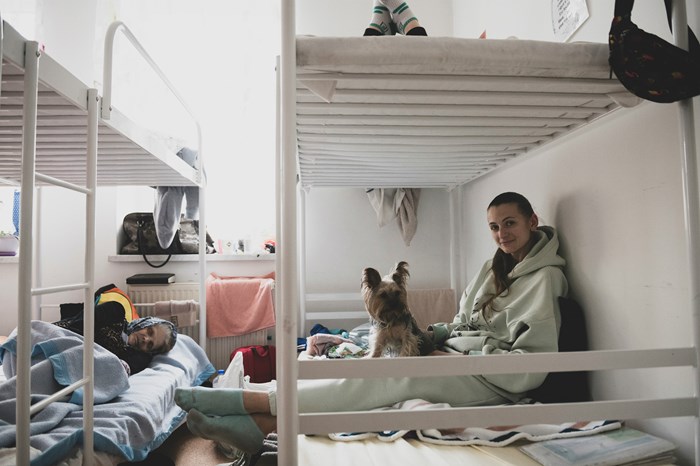 Irina Malko, 38, and her dog Zaya fled the city of Kharkiv and found temporary shelter at Central Baptist Church in Lviv.