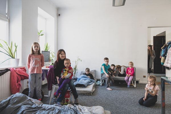 A family in a shelter at God’s Light Church in Lublin, Poland.