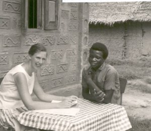 Barnwell in Ovonum, a village in Nigeria’s Mbembe area, with Livinus Enyam, who helped her learn the Mbembe language and begin developing an orthography, 1964