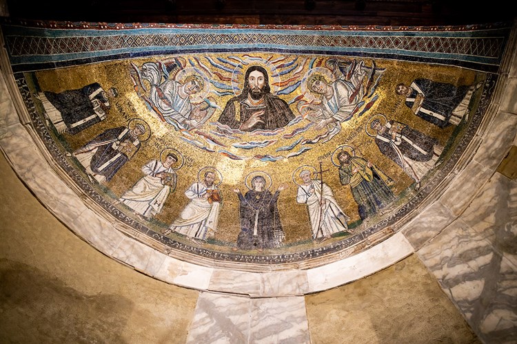 The apse of the central dome in the Lateran Baptistery places Mary between the apostle Paul to her left and the apostle Peter to her right, with Jesus above all. In this mosaic, Mary can be seen with her arms in the orans pose, “lifting up holy hands” (1 Tim. 2:8). ROME — 4th century