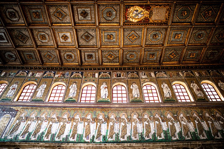 In the Basilica Sant’Apollinare Nuovo, 22 woman martyrs, ranked just below the apostles, are led by the Magi toward Mary and the newborn Christ. Each is identified by name and honored for giving her life to Jesus. Ravenna — 6th century