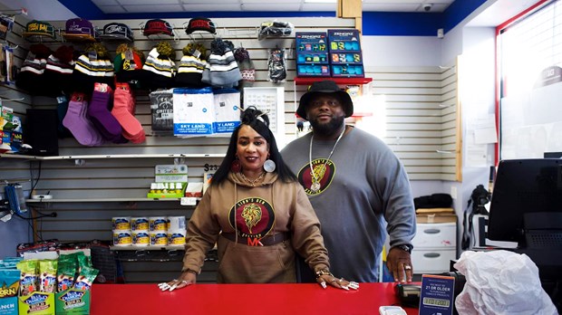 Larry and Sharon Cook at the front counter of The Lion's Den.