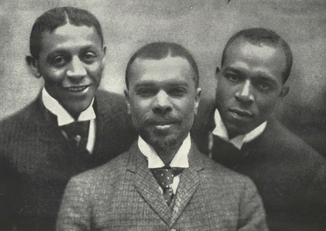 James Weldon Johnson (center) with composers Bob Cole and J. Rosamond Johnson.