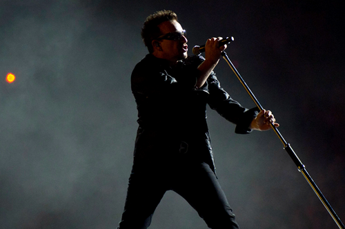 Bono performing with U2 in 2011.