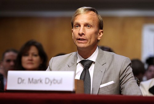 Mark Dybul testifying before Congress, advocating support for the global fight against HIV/AIDS 