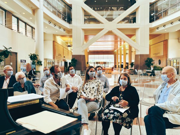 Kathy and Tim Keller (right) sitting with a group of friends for worship at NIH hospital. Kathy and Tim Keller (right) sitting with a group of friends for worship at NIH hospital.