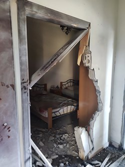Damage to a home in Alma al-Shaab