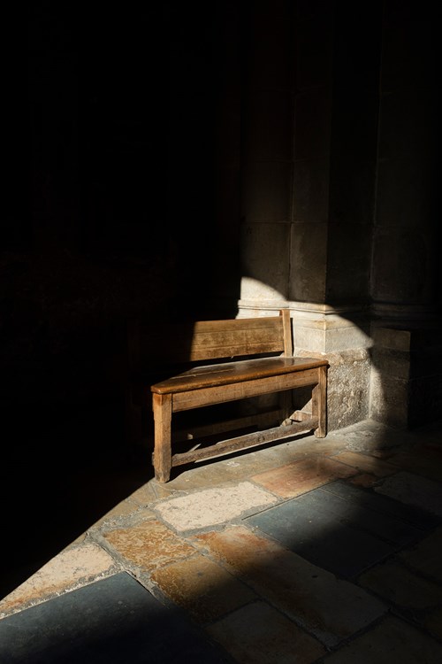 A bench just inside the church.