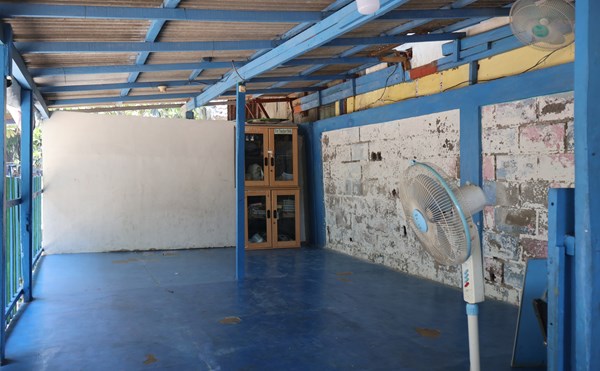In the cemetery complex, Compassion First held classes on the blue covered porch. In the cemetery complex, Compassion First held classes on the blue covered porch.