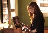 Telly (Julianne Moore) grieves the loss of a child