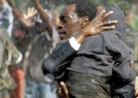 Don Cheadle plays Paul Rusesabagina, who rescues more than 1200 Tutsis