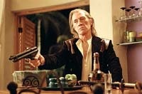 Bill (David Carradine) gets trigger-happy