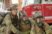 John Travolta, Kevin Chapman and Joaquin Phoenix as Baltimore firefighters