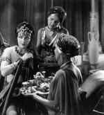 Mary Magdalene (Jacqueline Logan, left) is depicted as a prostitute early in the film