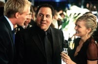 Jon Favreau, as the agent, joins the stars at a cocktail party