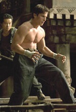 A buff Christian Bale as Bruce Wayne, training for the job