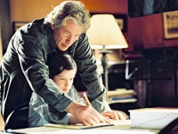 Saul Naumann (Richard Gere) helps his daughter Eliza study for the spelling bee