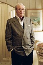 Michael Caine is Isabel's father, Nigel, a suave spellcaster