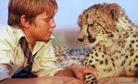 Xan (Alexander Michaletos) and his cheetah friend, Duma