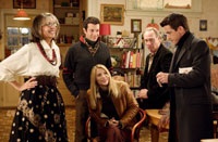 Julie Morton (Claire Danes, seated) gets to know Stone family members Sybil, Thad (Ty Giordano), Kelly (Craig T. Nelson) and Everett