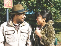 Norton and his wife Trixie (Regina Hall)