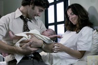 Mossad agent Avner (Eric Bana) and wife Daphna (Ayelet Zurer) celebrate the birth of their baby