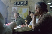 Generals Harari (Moshe Ivgy) and Zamir (Ami Weinberg) and discuss plans with Prime Minister Golda Meir (Lynn Cohen)