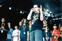 Paul Green and students on stage at a performance