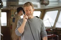 William H. Macy in the role of Admiral Sandecker