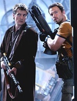 Capt. Mal Reynolds (Nathan Fillion) and Jayne (Adam Baldwin) are ready for some action