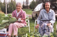 Sisters Freida and Benet work in the garden at St. Scholastica Monastery