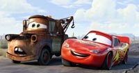 Mater (Larry the Cable Guy) and McQueen have a little chat