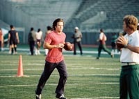 At the tryouts with Coach Vermeil (right) looking on