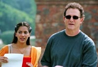 Albert Brooks and his assistant Maya (Sheetal Sheth), trying to find some yuks