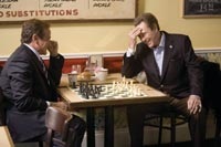 Dobbs and his manager Jack Menken (Christopher Walken) play a game of chess